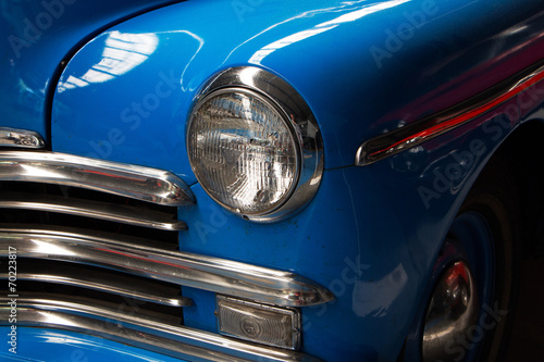 Part of an old blue car close up © wlad074