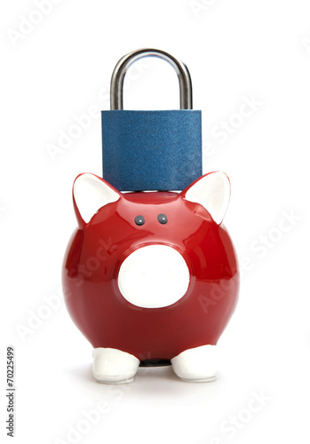 Safe saving. Piggy bank with padlock