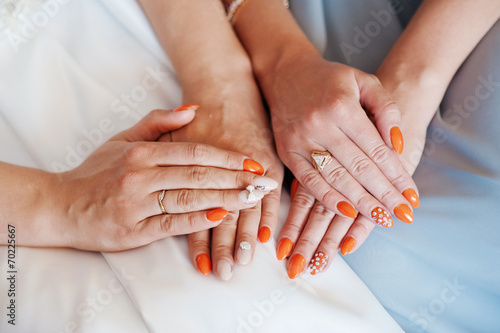 Hands with decorative nails
