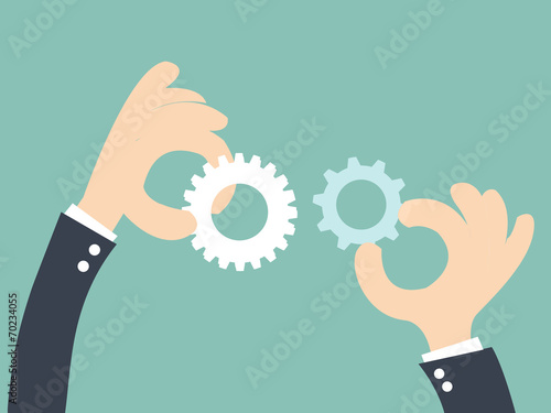 Businessman builds a business system with gear