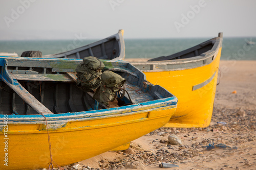 Two Colored fishing boats on the beach of Sidi Kaouki photo