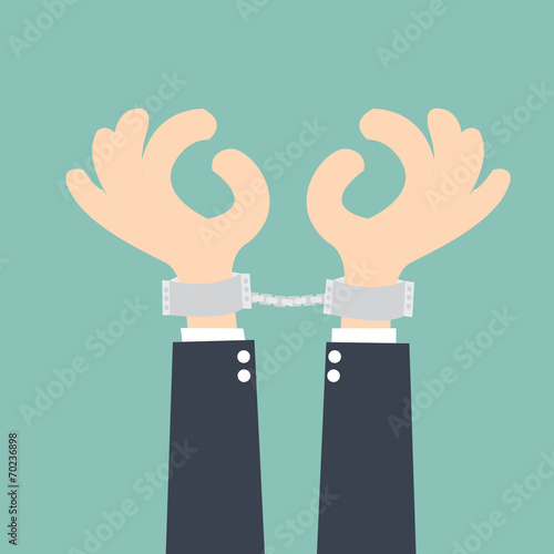 businessman handcuffed hands