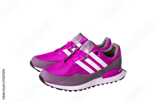pink sport shoes for running on white background