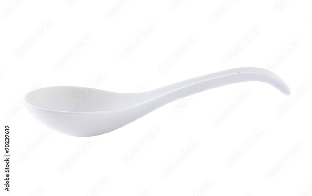 White empty ceramic spoon for soup on white background White empty ceramic spoon for soup on white background