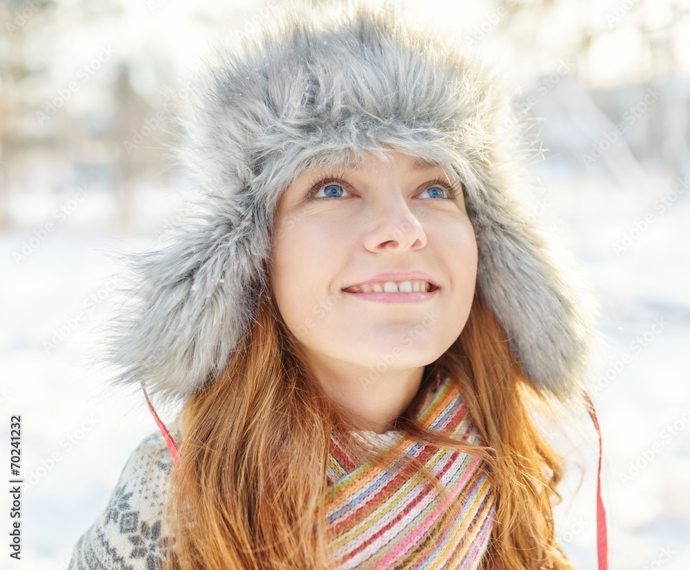 Winter portrait of young woman in fur hat Winter portrait of young woman in fur hat