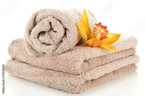 Fototapeta Naklejka Na Ścianę i Meble -  Orchid flower and towels isolated on white