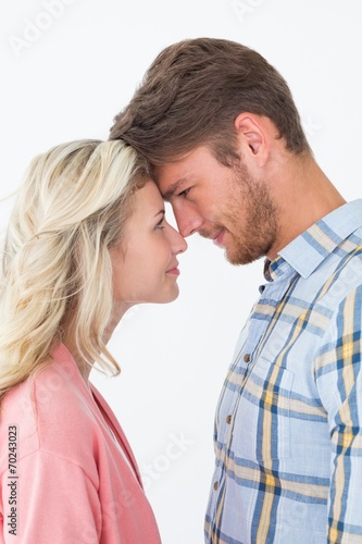 Young couple looking at each other over