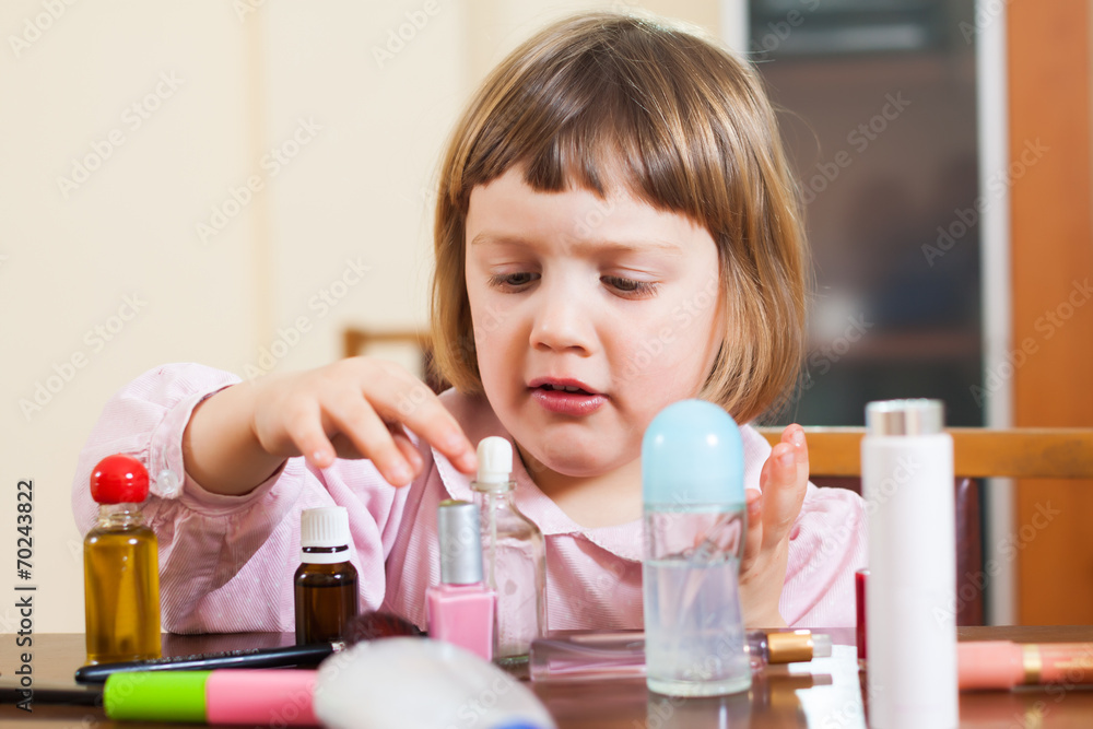 Little girl playing with makeup Little girl playing with makeup