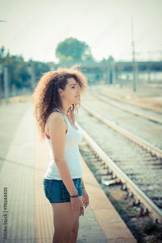 young beautiful long curly hair hipster woman