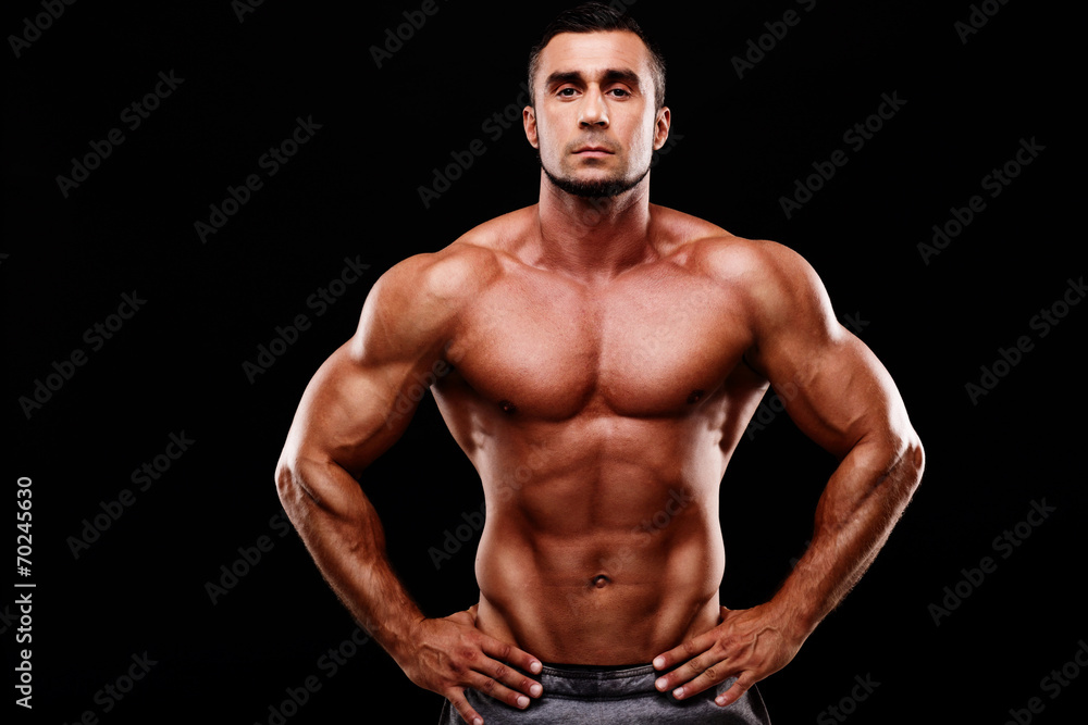 Handsome muscular sportsman isolated Handsome muscular sportsman isolated