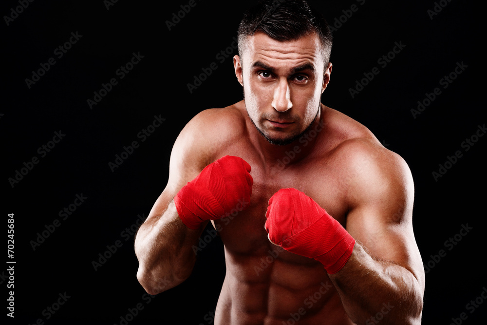 Handsome muscular sportsman isolated