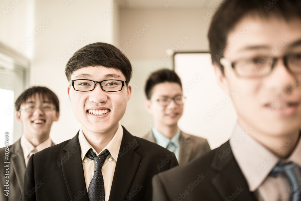 Group of business people with businessman leader on foreground Group of business people with businessman leader on foreground