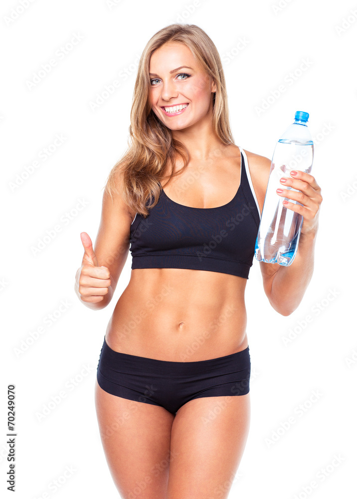 Young athletic girl with bottle of water on white Young athletic girl with bottle of water on white