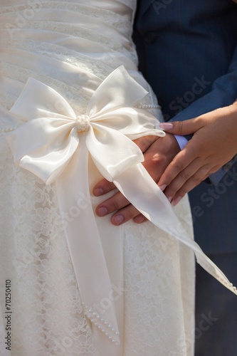 bridesmaid bow on wedding dress