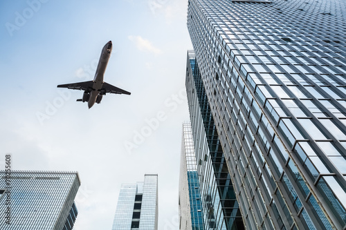 airplane and modern office building