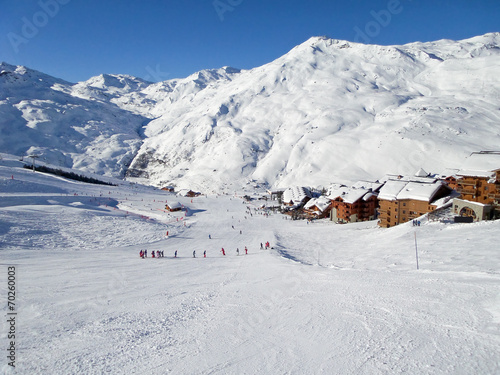 Ski slope at Les Menuires resort, snow winter sports in the Alps, France photo