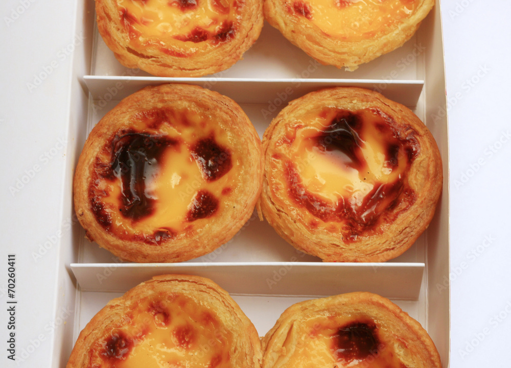 delicious portuguese egg tart on white box