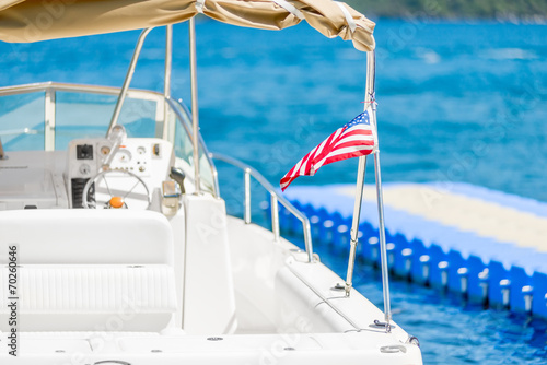 small sea yacht closeup with American flag