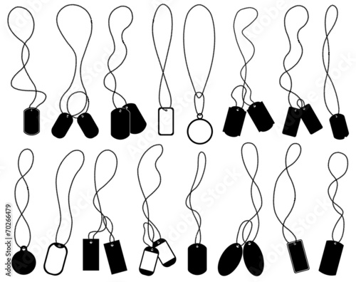Set of different dog tags isolated on white