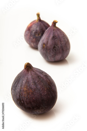 Fresh turkish figs isolated on a white studio background.
