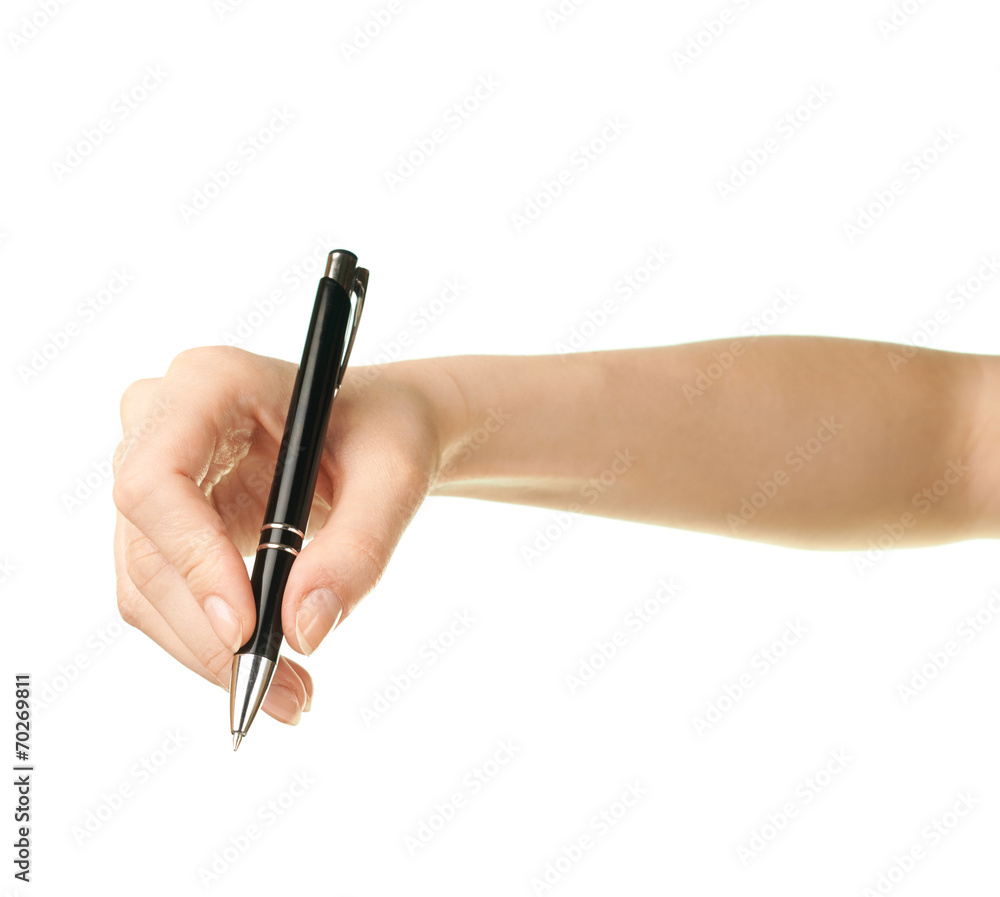Female caucasian hand holding pen Female caucasian hand holding pen