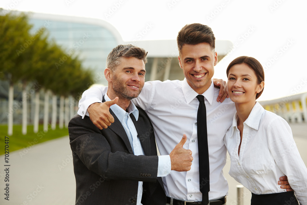 Business people giving thumbs up. Business Team Business people giving thumbs up. Business Team