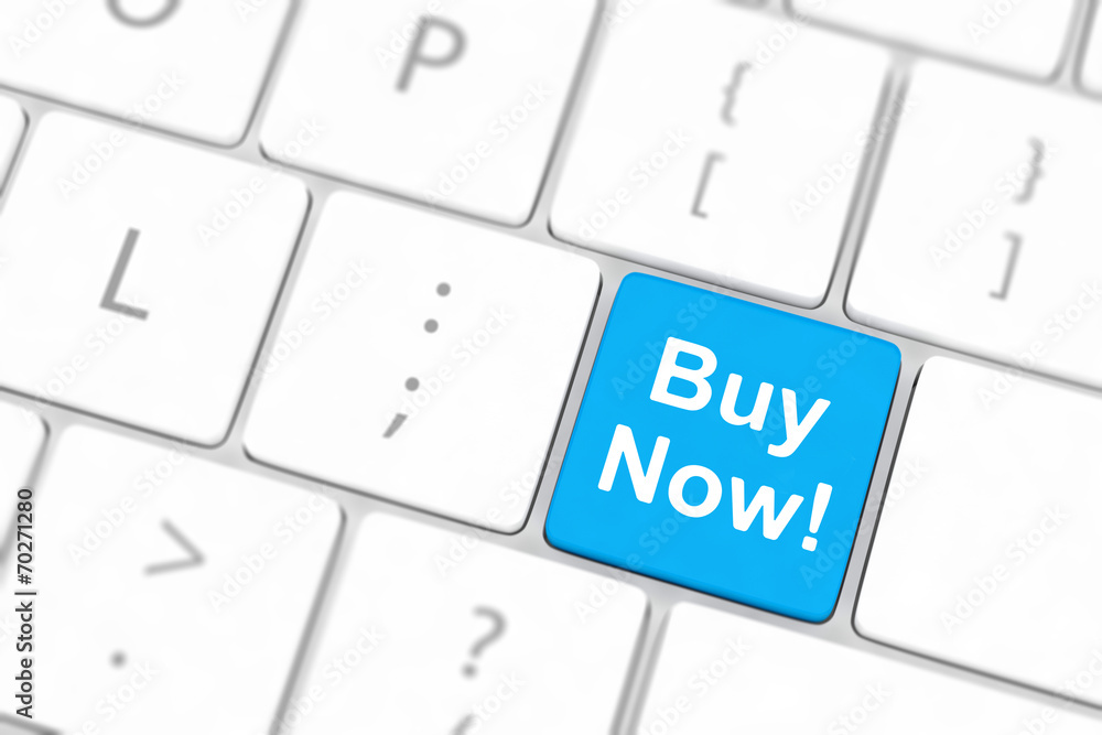 Buy now key on a white keyboard Buy now key on a white keyboard