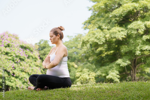 Wallpaper Mural pregnant woman mother belly relaxing park yoga prayer Torontodigital.ca