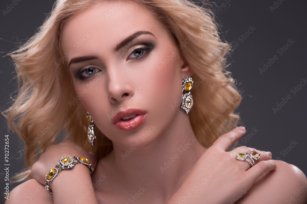 Wonderful blonde wearing jewelry