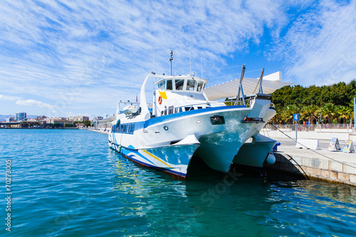 Touristic catamaran at port of Málaga, Spain
