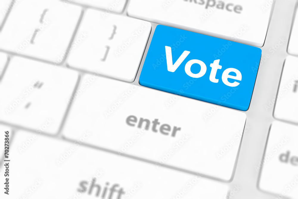 vote button on computer keyboard showing internet concept vote button on computer keyboard showing internet concept