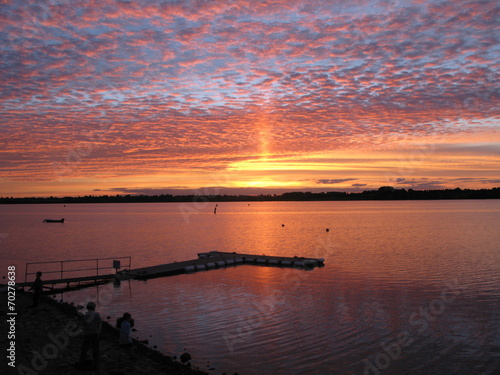 beautiful sunset over draycote water lake