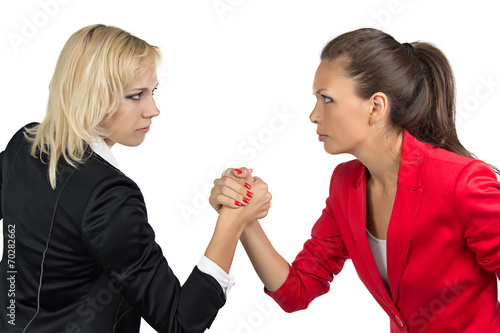 Cuadro en lienzo Arm wrestling of two businesswoman