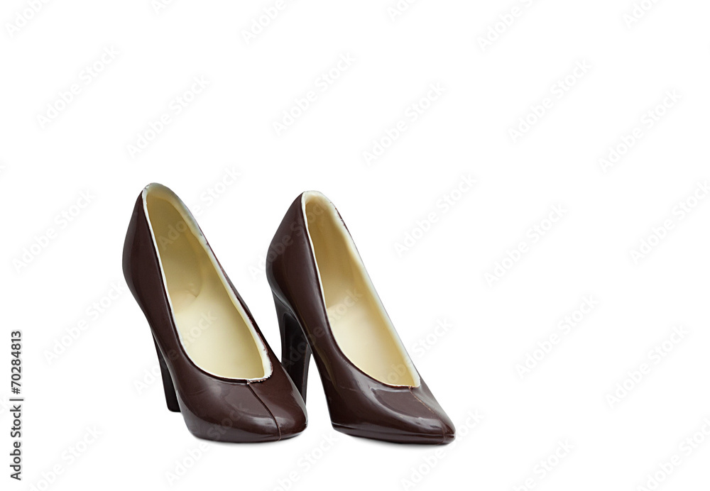 Tasty shoes of dark chocolate, isolated on white Tasty shoes of dark chocolate, isolated on white