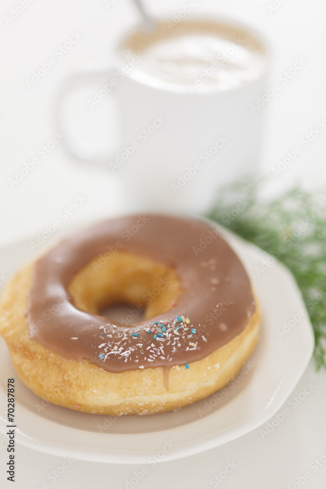 Donut with cappuccino coffee Donut with cappuccino coffee