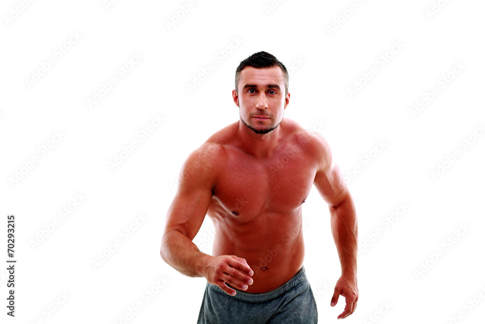 Portrait of muscular man athlete doing running exercise