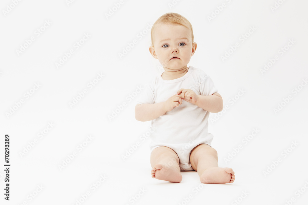 Portrait of young baby girl, studio. Portrait of young baby girl, studio.