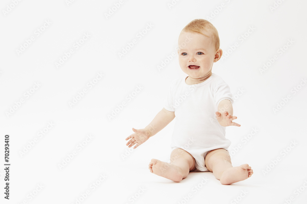 Young baby girl looking away, studio. Young baby girl looking away, studio.