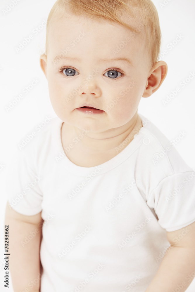 Young baby girl looking away, studio. Young baby girl looking away, studio.