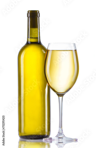 Glass and bottle of white wine isolated on white