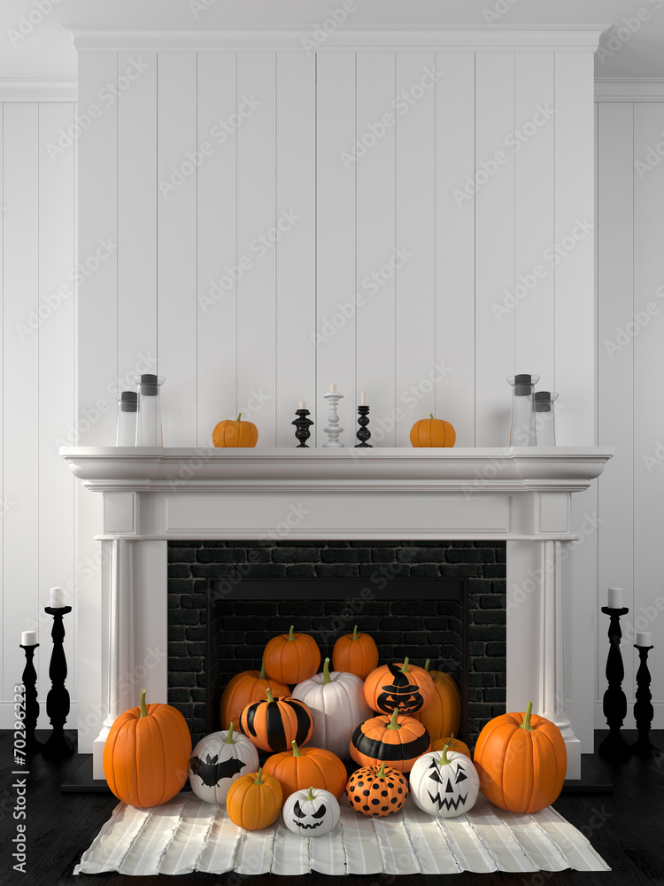 Fototapeta premium White fireplace decorated with pumpkins for Halloween