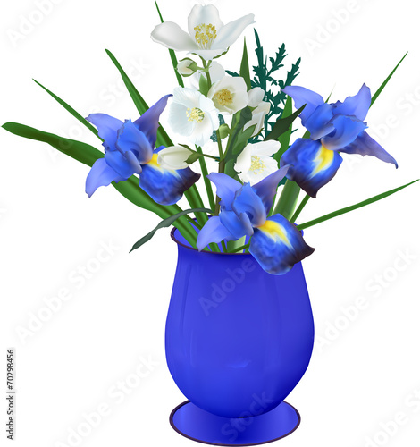 bunch of iris and jasmine flowers in blue vase