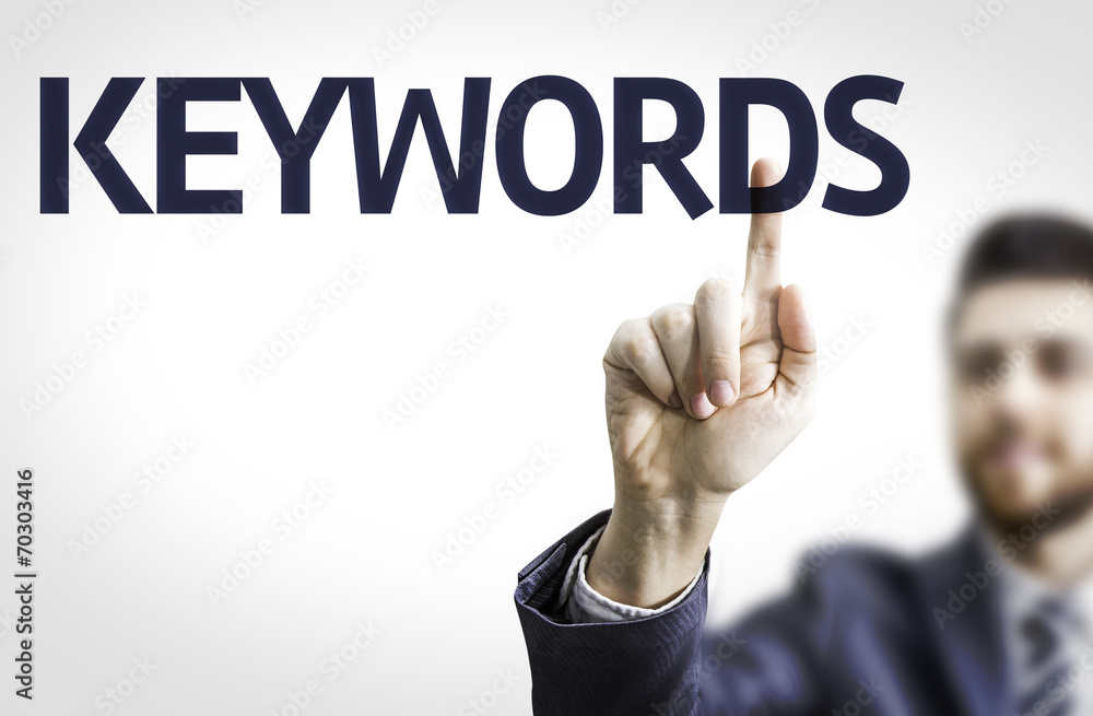 Business man pointing the text: Keywords Business man pointing the text: Keywords