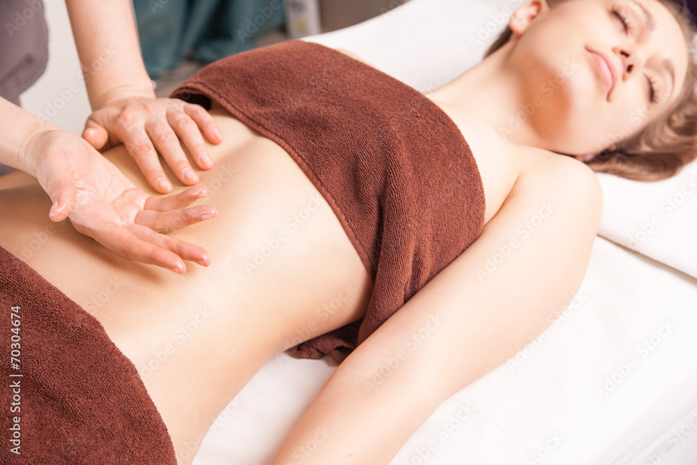 Woman enjoying Ayurveda oil massage in spa Woman enjoying Ayurveda oil massage in spa