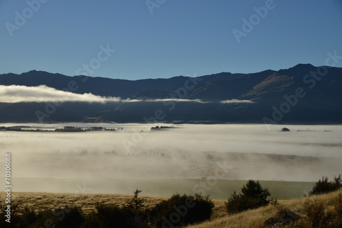 Morning foggy landscape between Wanaka and Hawea  South Island