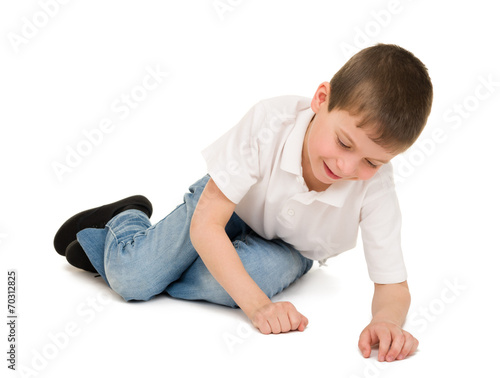 boy sitting and playing