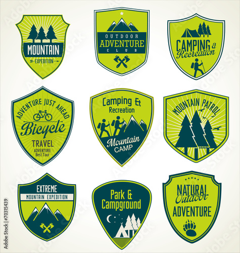 Set of outdoor adventure blue and green retro badges