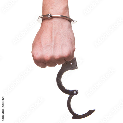 male hand in police handcuffs showing gesture isolated