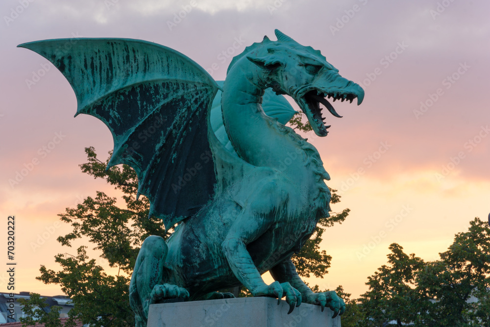 Dragon on the dragon bridge in Ljubljana at dawn