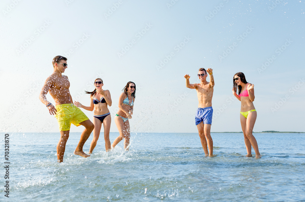 happy friends having fun on summer beach happy friends having fun on summer beach